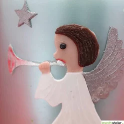 türkise Weihnachtskerze mit Trompetenengel