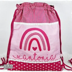 Turnbeutel-/Rucksack pink/weiß mit Doodlestickerei Regenbogen und Wunschname