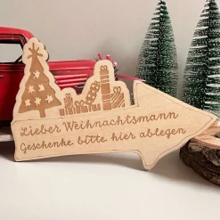 Weihnachtsdekoration, Holzschild mit Spruch "Geschenke bitte hier ablegen"