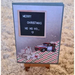 Weihnachtskarte " Merry Christmas - HOHOHO " Geschenke , Weihnachtsmann im Auto