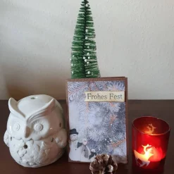 Weihnachtskarte Frohes Fest mit Schneemann und Zweigen