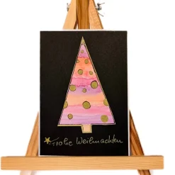 Weihnachtskarte mit handgezeichnetem rosa Weihnachtsbaum mit goldenen Sternen, Aquarell schwarz