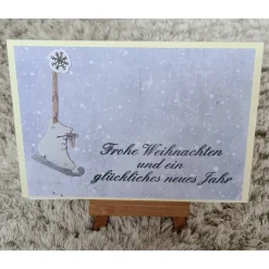 Weihnachtskarte mit Schlittschuhe - Frohe Weihnachten - Schneeflocke