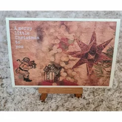 Weihnachtskarte mit Sternmotiv , Weihnachtsmann , Geschenk