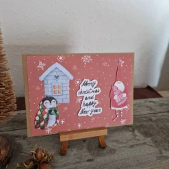 Weihnachtskarte mit Weihnachtsmann - Pinguin - Schneeflocken