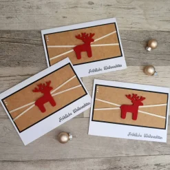 Weihnachtskarten mit rotem Rentier