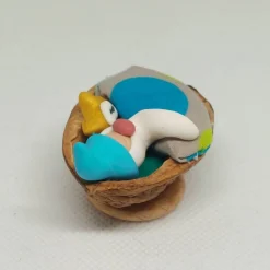 Wichtel im Walnussbettchen – Weihnachtsdeko aus Polymer Clay in türkis