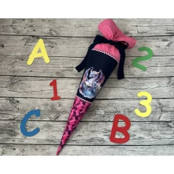 zauberhafte Schultüte / Zuckertüte mit Drache der ein Buch liest in Pink Blau
