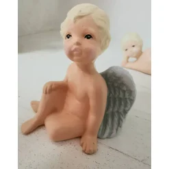 Zauberhaftes Puttentrio aus Keramik